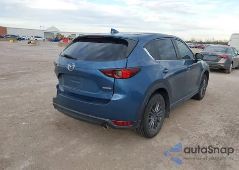 2021 Mazda Cx-5 Sport z USA, uszkodzony, nr VIN JM3KFABM5M0369396